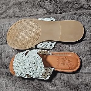 White and tan sandals